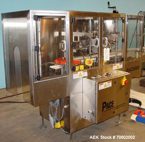 Used Pace Model BOA5000 Stainless Steel Bottle Orientator. With 20 foot long x 4 1/2 inch wide Delrin chain stainless steel frame conveyor, 2 inch wide x 36 inch rubber top hold down belt. 1/60/220. ...
