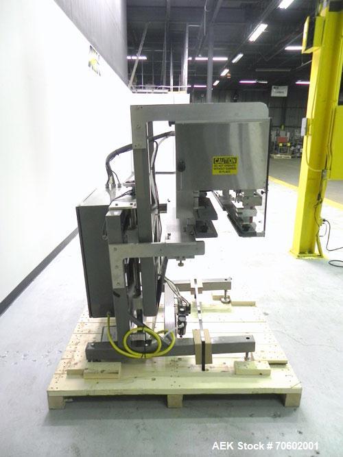 Used Palace Packing Model B3B-PO-A Inline Bottle Orienter. Machine is rated at speeds up to 300 bottles per minute. Does handle, neck, and panel orienting. Inline unit for installation over conveyors...