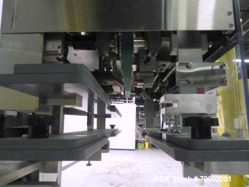 Used Palace Packing Model B3B-PO-A Inline Bottle Orienter. Machine is rated at speeds up to 300 bottles per minute. Does handle, neck, and panel orienting. Inline unit for installation over conveyors...