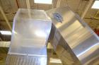 Used Bulk bottle live bottom hopper with integrated stainless steel elevator.