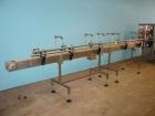 Used Pace Model BOA5000 Stainless Steel Bottle Orientator. With 20 foot long x 4 1/2 inch wide Delrin chain stainless steel frame conveyor, 2 inch wide x 36 inch rubber top hold down belt. 1/60/220. ...