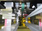 Used Palace Packing Model B3B-PO-A Inline Bottle Orienter. Machine is rated at speeds up to 300 bottles per minute. Does handle, neck, and panel orienting. Inline unit for installation over conveyors...