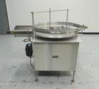 Used Unscramber, Rotary Accumulation Table.