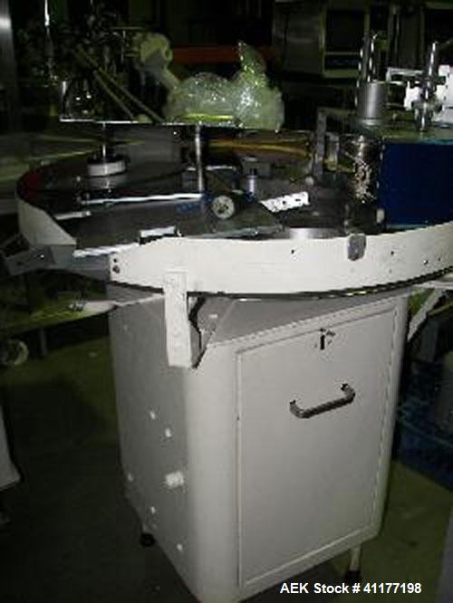 Used Island 36 inch dia m accumulation table.
