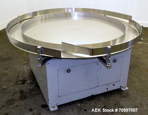 Used Accumulation Table, 55” Diameter, Stainless Steel.Driven by a 0.4 kw, 60/460 volt, 1710 rpm motor.Includes side rails. Mounted on casters.Machine footprint 60” long x 60” wide x 30” tall.
