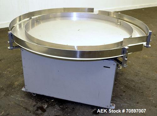 Used Accumulation Table, 55” Diameter, Stainless Steel.Driven by a 0.4 kw, 60/460 volt, 1710 rpm motor.Includes side rails. Mounted on casters.Machine footprint 60” long x 60” wide x 30” tall.