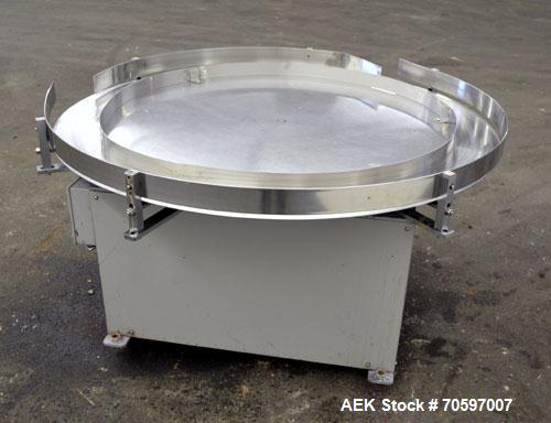 Used Accumulation Table, 55” Diameter, Stainless Steel.Driven by a 0.4 kw, 60/460 volt, 1710 rpm motor.Includes side rails. Mounted on casters.Machine footprint 60” long x 60” wide x 30” tall.