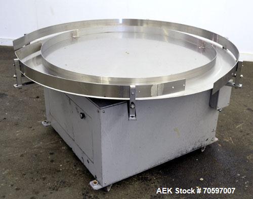 Used Accumulation Table, 55” Diameter, Stainless Steel.Driven by a 0.4 kw, 60/460 volt, 1710 rpm motor.Includes side rails. Mounted on casters.Machine footprint 60” long x 60” wide x 30” tall.