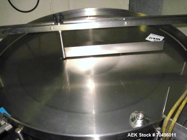 Used Accumulation Table, 36" Diameter Stainless Steel Construction.