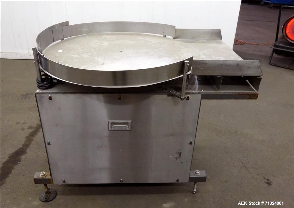 Used Accumulation Table, 36" Diameter. Stainless steel construction. Driven by an approximate 1/4 hp motor. Mounted on (4) adjustable legs.