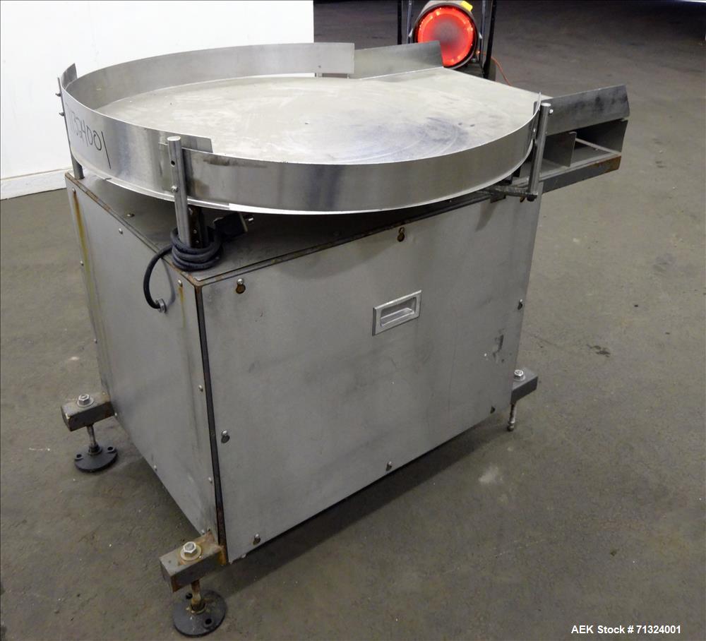 Used Accumulation Table, 36" Diameter. Stainless steel construction. Driven by an approximate 1/4 hp motor. Mounted on (4) adjustable legs.