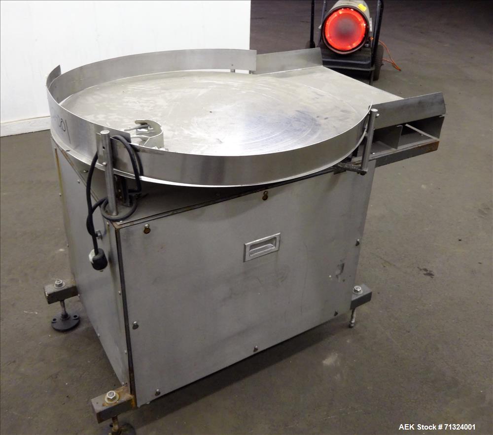 Used Accumulation Table, 36" Diameter. Stainless steel construction. Driven by an approximate 1/4 hp motor. Mounted on (4) adjustable legs.