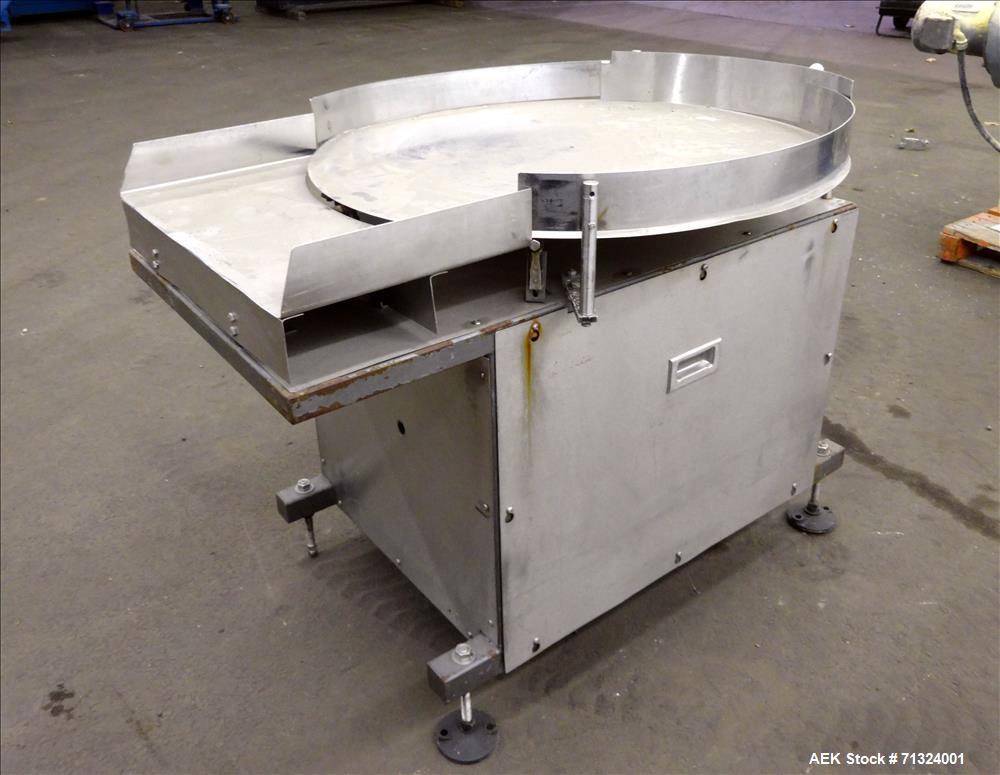 Used Accumulation Table, 36" Diameter. Stainless steel construction. Driven by an approximate 1/4 hp motor. Mounted on (4) adjustable legs.