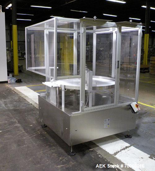 Used Cam-Pak Rotary Feeding/Unscrambling/Accumulation Table, Model TR-1200, 304 Stainless Steel. 1200mm (47.2’’) diameter plastic table, capacity of 400 bottles per minute, container size range Diame...