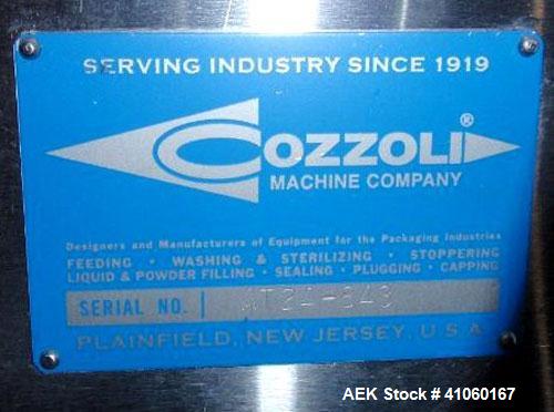 Used Cozzoli Machine Company Acummulating Table, Model AT24, Stainless Steel. 24" diameter table with drive. Serial #843.