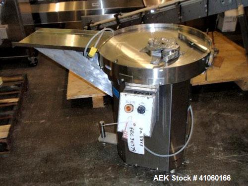 Used Cozzoli Machine Company Acummulating Table, model UT24, stainless steel. 24" diameter table with drive. Serial #844.