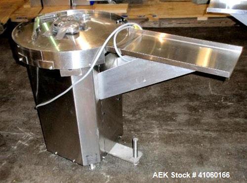 Used Cozzoli Machine Company Acummulating Table, model UT24, stainless steel. 24" diameter table with drive. Serial #844.