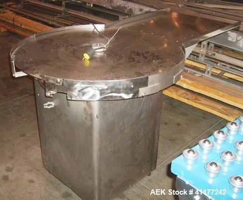 Used Cozzoli Unscrambler/Accumulating Table, Model UT36, Stainless Steel. 36’’ diameter table with rectangular dump section. Has variable speed controller.
