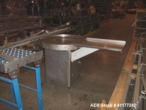 Used Cozzoli Unscrambler/Accumulating Table, Model UT36, Stainless Steel. 36’’ diameter table with rectangular dump section. Has variable speed controller.