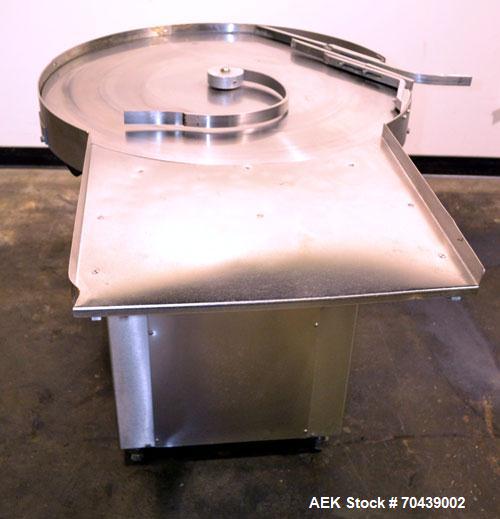 Used Cozzoli Unscrambler/Accumulating Table, Model UT30, Stainless Steel. 30’’ Diameter table with rectangular dump section. Driven by a 1/4 hp, 90 volt DC motor with a speed controller.