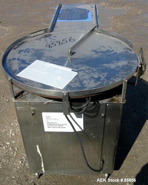 USED: Hull unscrambler/accumulating table, model 24A30. 30" diameter, stainless steel. 1" wide side rails, 12" wide x 24" long infeed section. Driven by a 1/2 hp, 1/60/115/230 volt, 1725 rpm varispee...