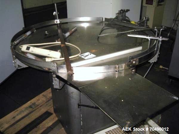 Used Island Equipment Accumulation Table, 40" Diameter Stainless Steel Construction.