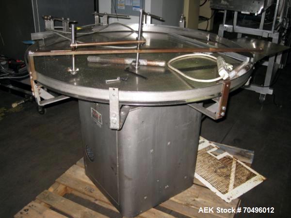 Used Island Equipment Accumulation Table, 40" Diameter Stainless Steel Construction.