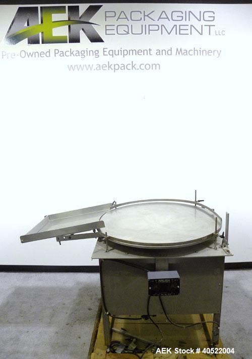 Used Kalish Unscrambler Accumulating Table, model 7500, 304 stainless steel. 36" diameter table, adjustable side rails, 20" wide x 24" long infeed section. Driven by a 1/4 hp, 90 volt DC motor with s...