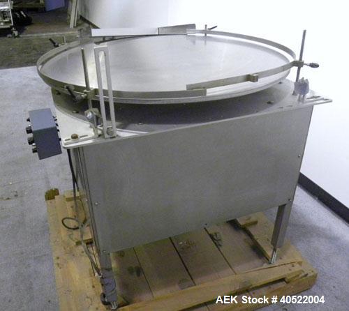 Used Kalish Unscrambler Accumulating Table, model 7500, 304 stainless steel. 36" diameter table, adjustable side rails, 20" wide x 24" long infeed section. Driven by a 1/4 hp, 90 volt DC motor with s...