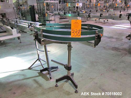 Used 40" Diameter stainless steel rotary accumulation table with open base and variable speed drive.
