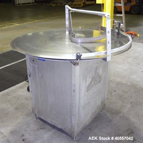 Used Equipment Exporters Accumulation Table, 45" diameter, 304 stainless steel. Driven by a 1/15 hp, 90 volt DC gear motor. Mounted on an aluminum frame. Includes a Dayton speed controller.