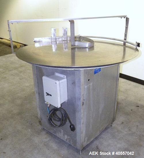 Used Equipment Exporters Accumulation Table, 45" diameter, 304 stainless steel. Driven by a 1/15 hp, 90 volt DC gear motor. Mounted on an aluminum frame. Includes a Dayton speed controller.