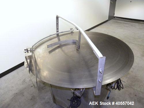 Used Equipment Exporters Accumulation Table, 45" diameter, 304 stainless steel. Driven by a 1/15 hp, 90 volt DC gear motor. Mounted on an aluminum frame. Includes a Dayton speed controller.