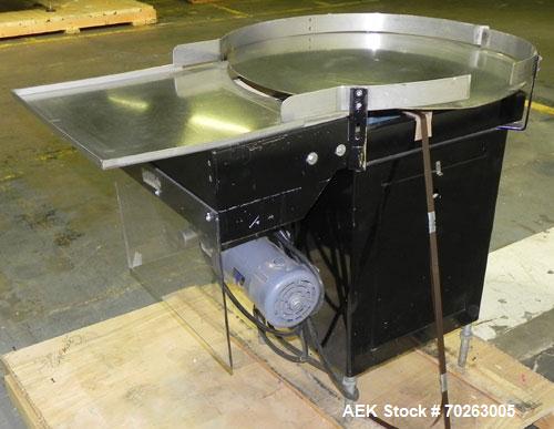 Used Production Equipment Rotary Accumulation Table, 30" Diameter, Stainless Steel. 2" Tall side rails. Driven by a 1/4 hp, 90 volt, 1750 rpm DC gear motor, ratio 40 to 1. Mounted on an carbon steel ...