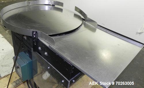 Used Production Equipment Rotary Accumulation Table, 30" Diameter, Stainless Steel. 2" Tall side rails. Driven by a 1/4 hp, 90 volt, 1750 rpm DC gear motor, ratio 40 to 1. Mounted on an carbon steel ...