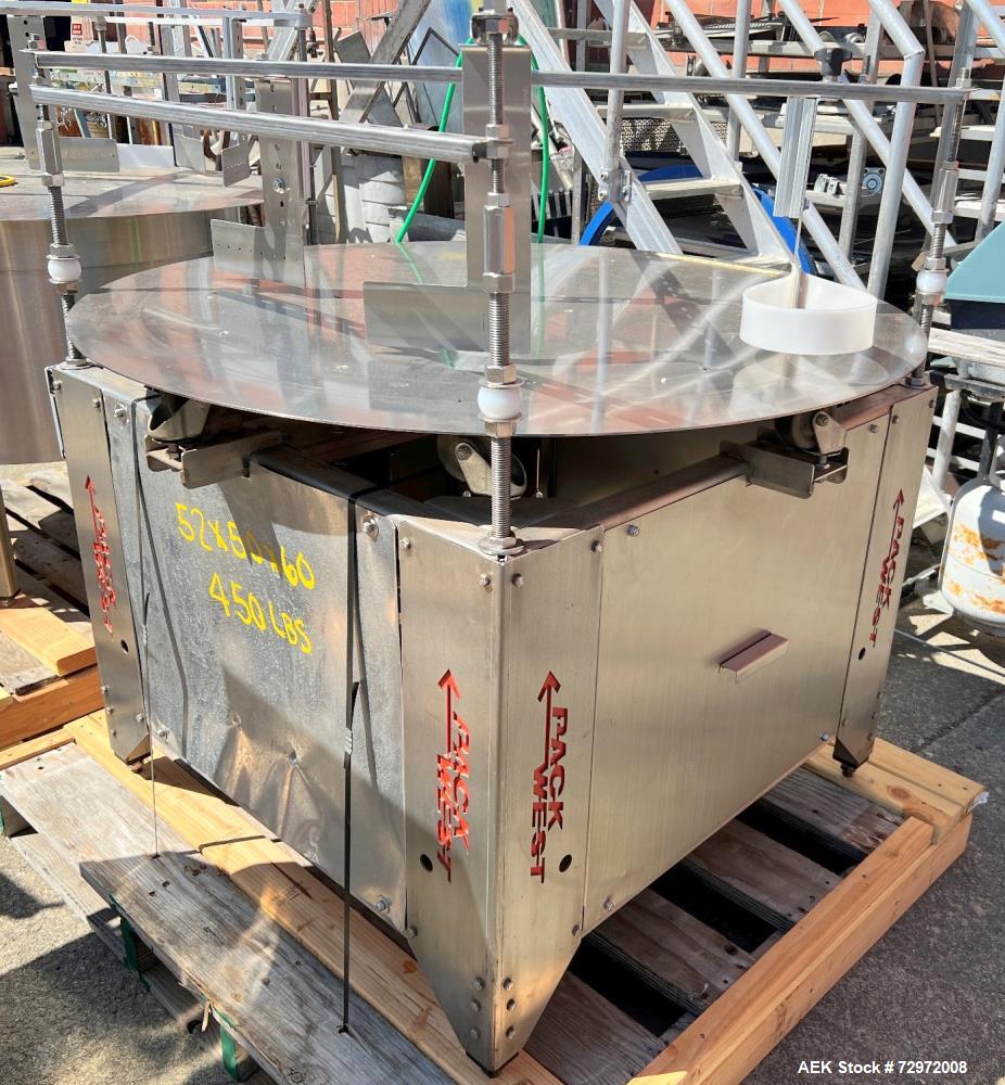 Used- PackWest 48" Diameter Stainless Steel Accumulation Table. Includes guide rails and arm that are secured to stainless s...