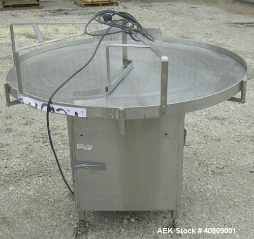 Used Perry Industries Unscrambler, Model VA-48, 304 stainless steel.  48" diameter table, 17 1/2" x 15 1/2" out.  Driven by an approximate 3 hp gearmotor, ratio 300:1.  Mounted on stainless steel leg...