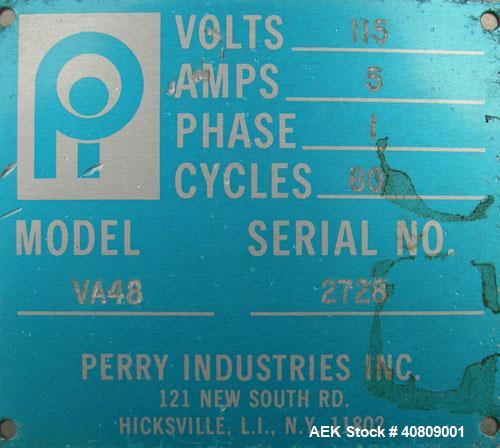 Used Perry Industries Unscrambler, Model VA-48, 304 stainless steel.  48" diameter table, 17 1/2" x 15 1/2" out.  Driven by an approximate 3 hp gearmotor, ratio 300:1.  Mounted on stainless steel leg...
