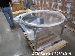Approximately 42" Diam stainless steel accumulation table.