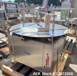 Used- PackWest 48" Diameter Stainless Steel Accumulation Table. Includes guide rails and arm that are secured to stainless s...