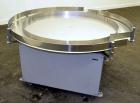 Used Accumulation Table, 55” Diameter, Stainless Steel.Driven by a 0.4 kw, 60/460 volt, 1710 rpm motor.Includes side rails. Mounted on casters.Machine footprint 60” long x 60” wide x 30” tall.