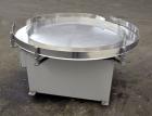 Used Accumulation Table, 55” Diameter, Stainless Steel.Driven by a 0.4 kw, 60/460 volt, 1710 rpm motor.Includes side rails. Mounted on casters.Machine footprint 60” long x 60” wide x 30” tall.