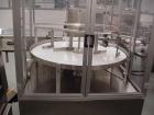 Used Cam-Pak Rotary Feeding/Unscrambling/Accumulation Table, Model TR-1200, 304 Stainless Steel. 1200mm (47.2’’) diameter plastic table, capacity of 400 bottles per minute, container size range Diame...