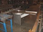 Used Cozzoli Unscrambler/Accumulating Table, Model UT36, Stainless Steel. 36’’ diameter table with rectangular dump section. Has variable speed controller.