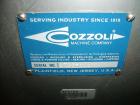 Used Cozzoli Unscrambler/Accumulating Table, Model UT36, Stainless Steel. 36’’ diameter table with rectangular dump section. Has variable speed controller.