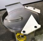 Used Cozzoli Unscrambler/Accumulating Table, Model UT36, Stainless Steel. 36’’ Diameter table with rectangular dump section. Driven by a 1/4hp, 90 volt DC motor with a speed controller. Mounted on ca...