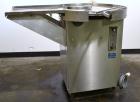 Used Cozzoli Unscrambler/Accumulating Table, Model UT30, Stainless Steel. 30’’ Diameter table with rectangular dump section. Driven by a 1/4 hp, 90 volt DC motor with a speed controller.