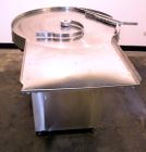 Used Cozzoli Unscrambler/Accumulating Table, Model UT30, Stainless Steel. 30’’ Diameter table with rectangular dump section. Driven by a 1/4 hp, 90 volt DC motor with a speed controller.