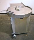 Used Cozzoli Unscrambler/Accumulating Table, Model UT30, Stainless Steel. 30’’ Diameter table with rectangular dump section. Driven by a 1/4 hp, 90 volt DC motor with a speed controller.