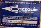 Used Cozzoli Unscrambler/Accumulating Table, Model UT30, Stainless Steel. 30’’ Diameter table with rectangular dump section. Driven by a 1/4 hp, 90 volt DC motor with a speed controller.
